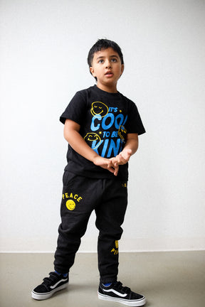 T-shirt pour enfant P/C x SmileyWorld « C'est cool d'être gentil » - Noir