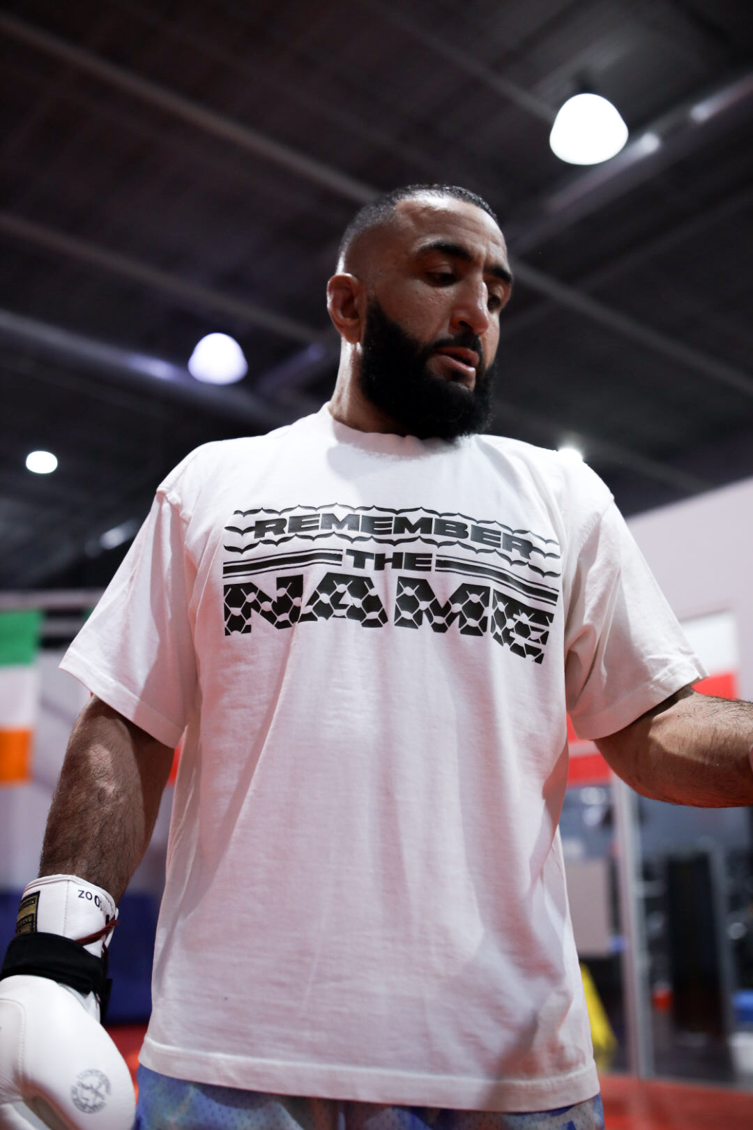 P/C x Belal Muhammad "Remember the Name" Keffiyeh Heavyweight T-Shirt - White